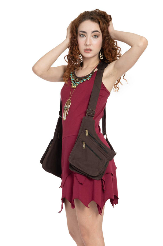 Plain Brown cotton canvas holster pocket belt bag with six pockets including zippered and popper-button closures, worn as a crossbody bag over a maroon dress.